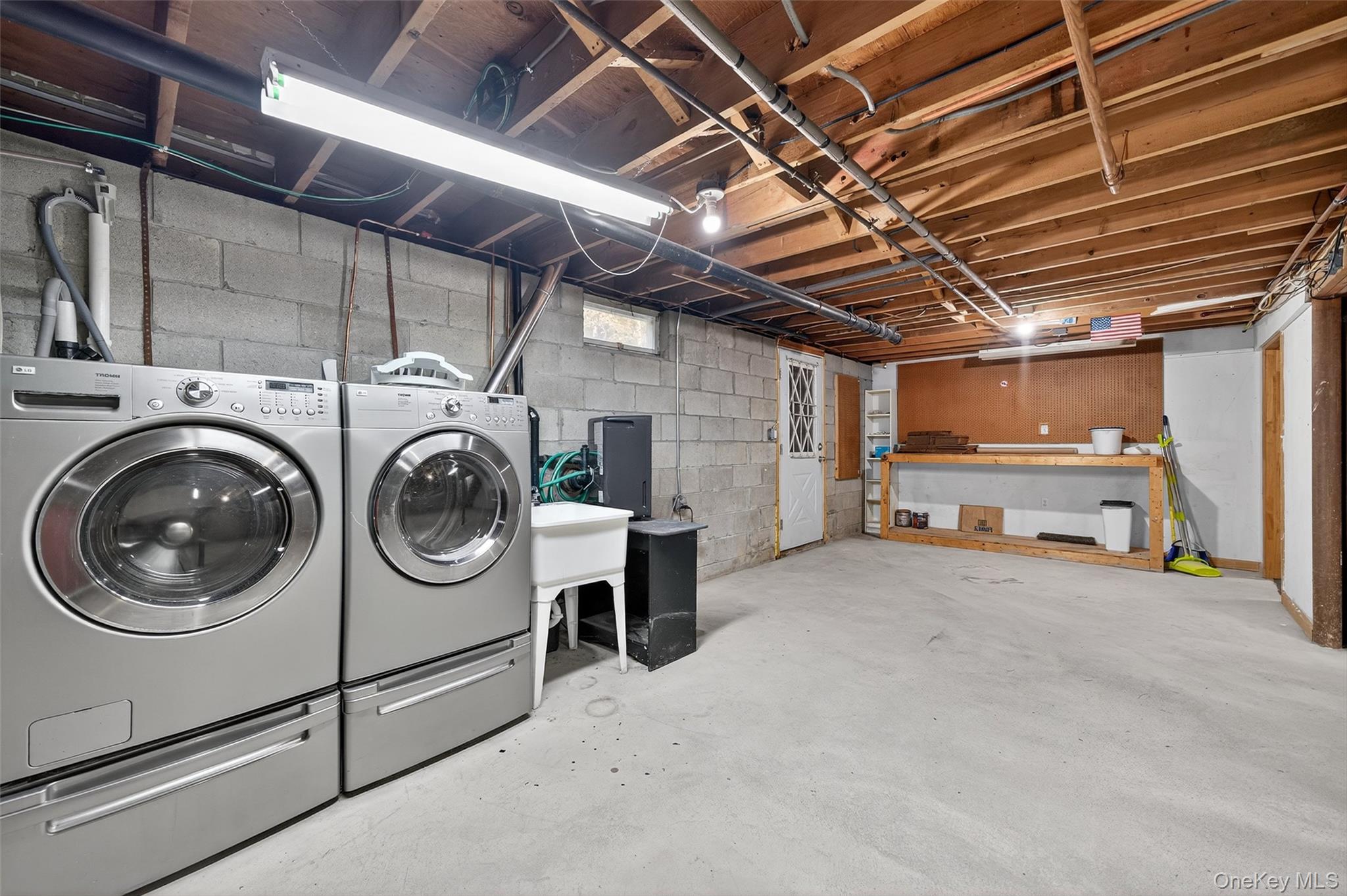 15 Nelson Road Monroe, NY 10950 - Photo 31 of 50 a view of a utility room with washer and dryer