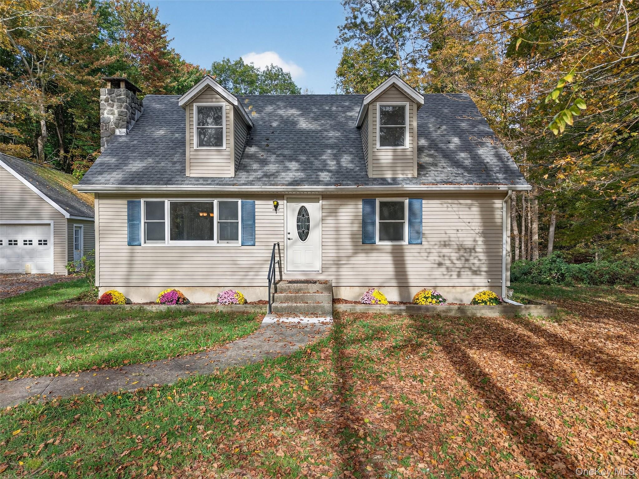 15 Nelson Road Monroe, NY 10950 - Photo 45 of 50 a front view of a house with a yard