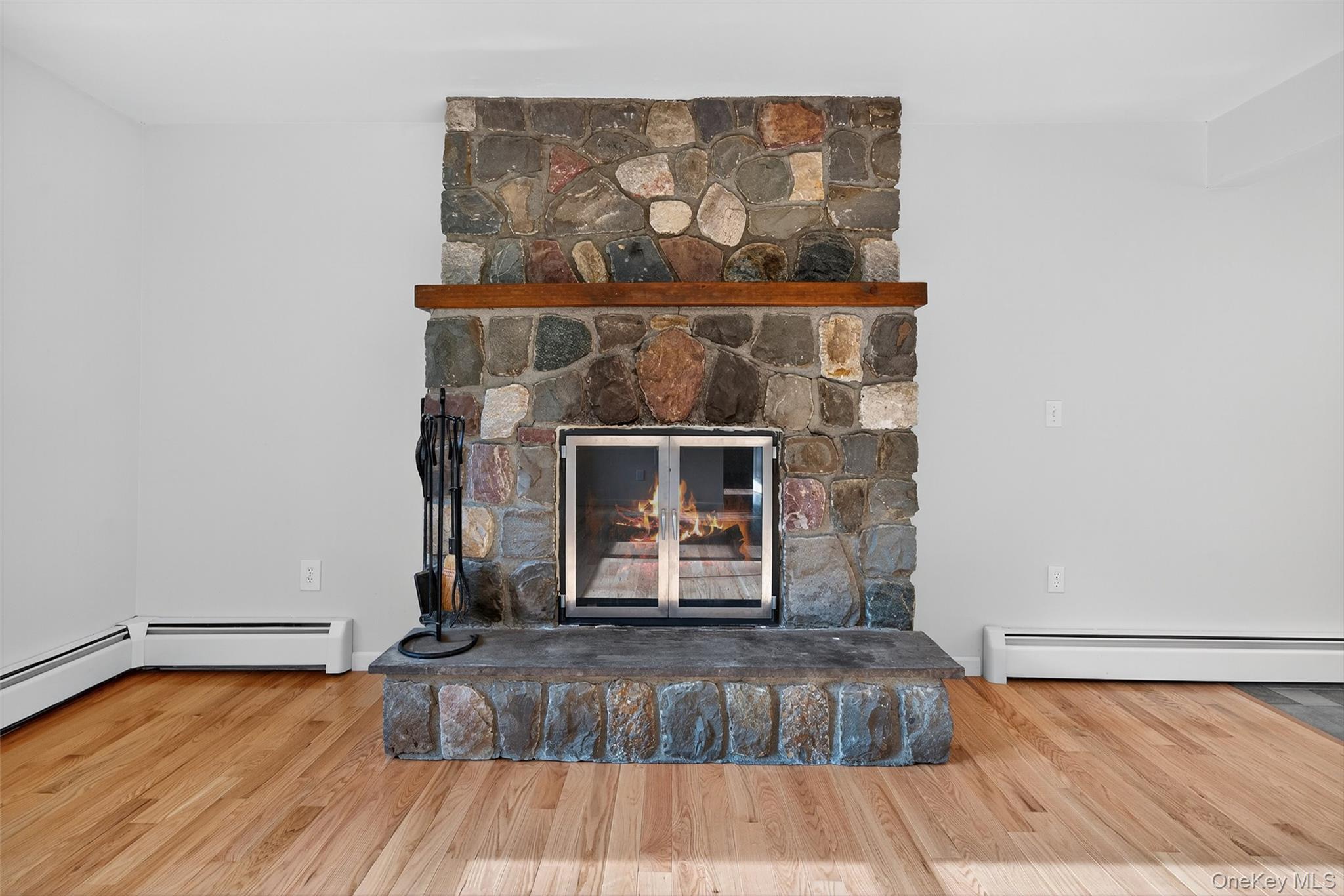 15 Nelson Road Monroe, NY 10950 - Photo 8 of 50 a living room with a fireplace