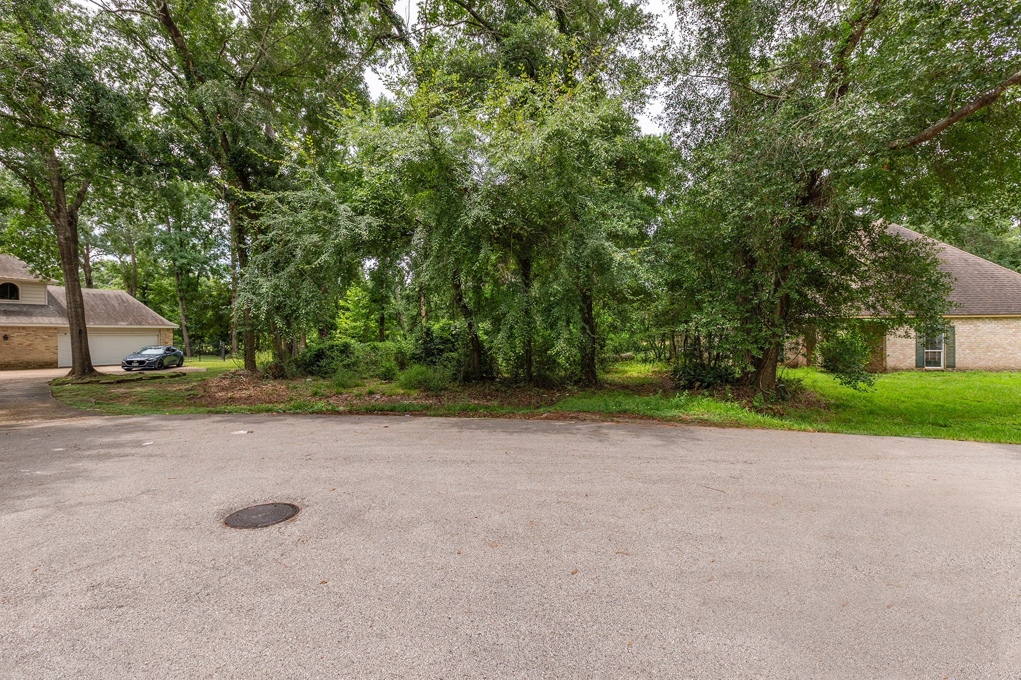 135 Jeb Stuart Lane Conroe, TX 77302 - Photo 5 of 16 a view of a house with a yard