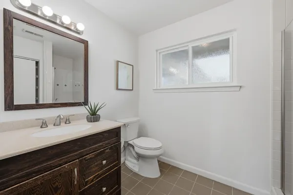 a house view with garden space