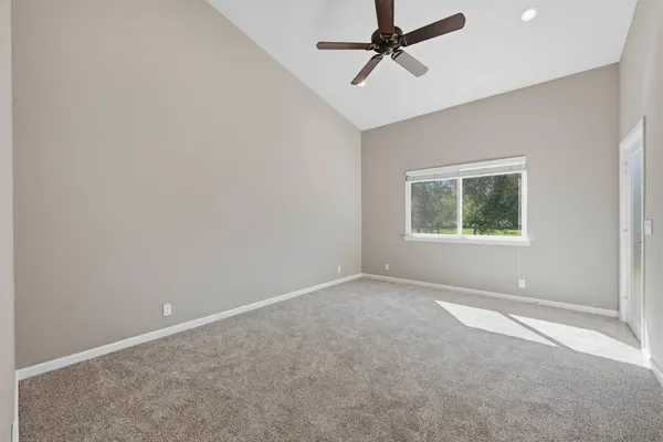 a house with trees in the background