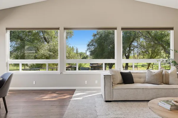 a front view of a house with a yard