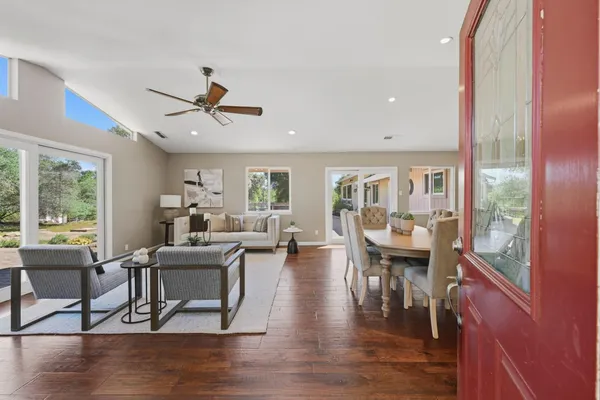 a view of a dining room with furniture window and outside view
