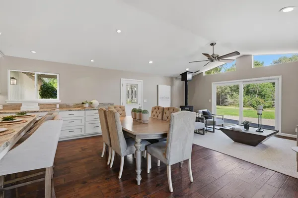 a view of a dining room with furniture window and outside view