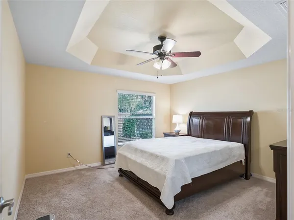 a bedroom with a bed and a closet