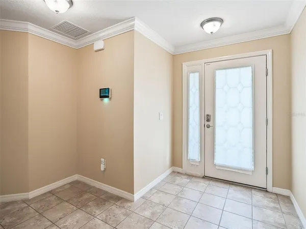 a kitchen with lots of counter space a sink dining table and chairs
