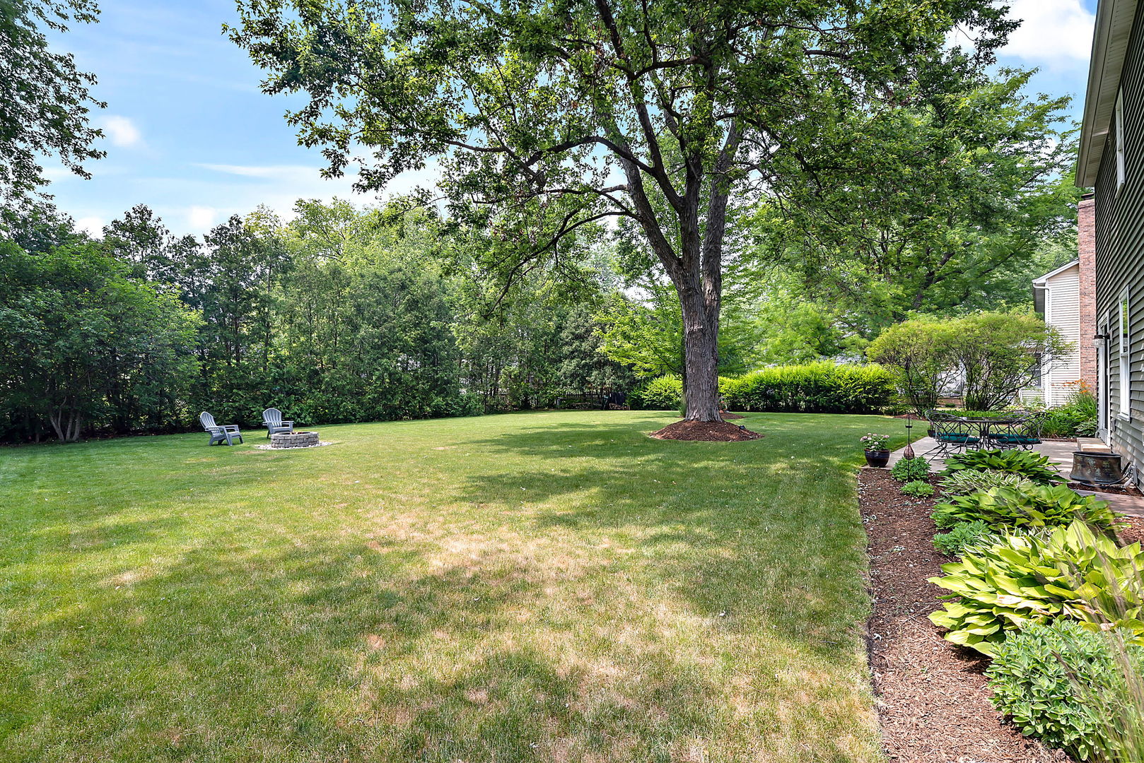 110 Bridgeport Lane Geneva, IL 60134 - Photo 25 of 27 a view of field with tall trees