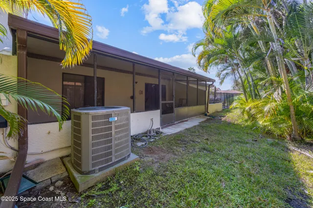 a view of a backyard with plants