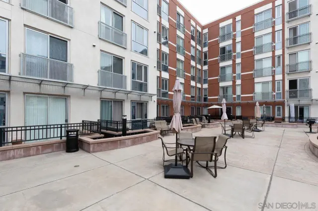 a view of swimming pool with outdoor seating