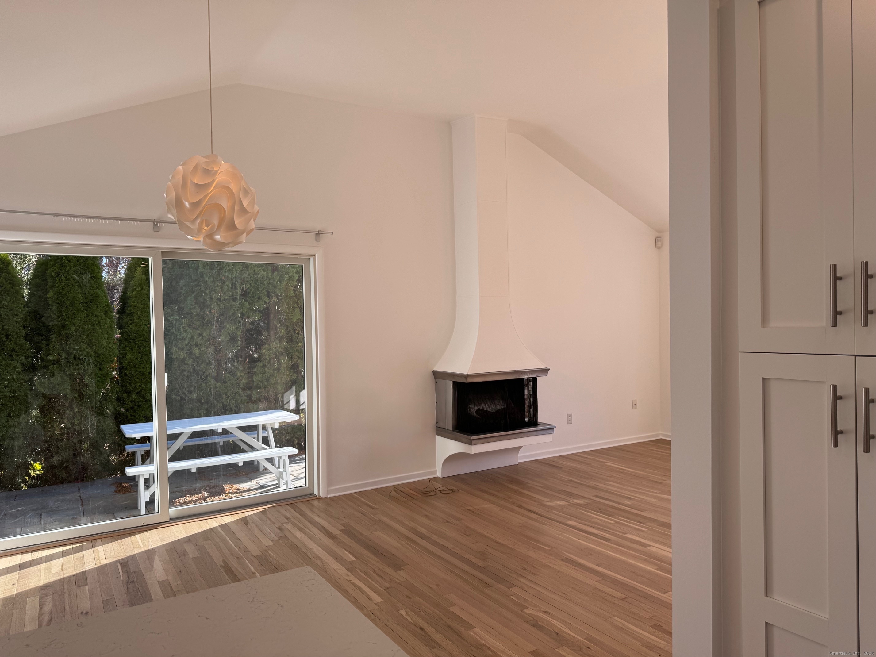 15 Sunwich Road Norwalk, CT 06853 - Photo 14 of 33 a view of an empty room with glass door and balcony