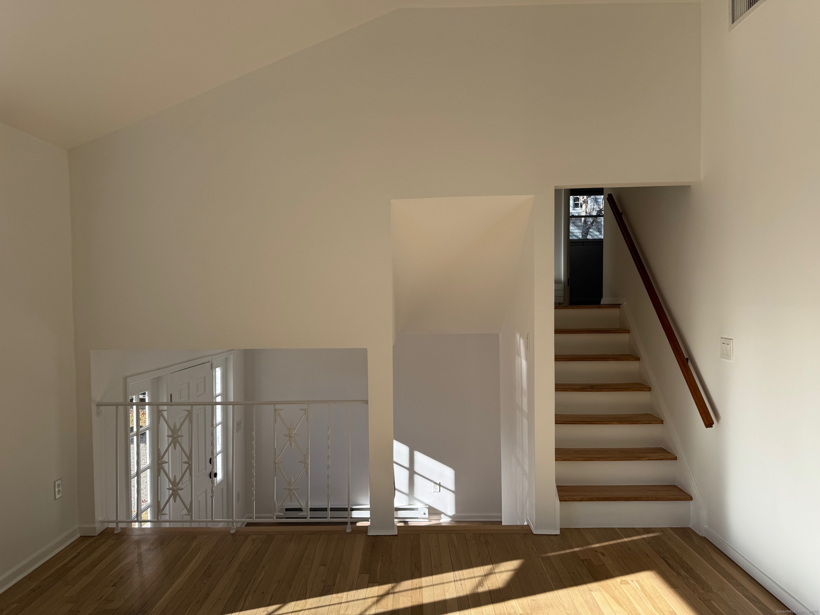 15 Sunwich Road Norwalk, CT 06853 - Photo 17 of 33 a view of entryway and hall with wooden floor