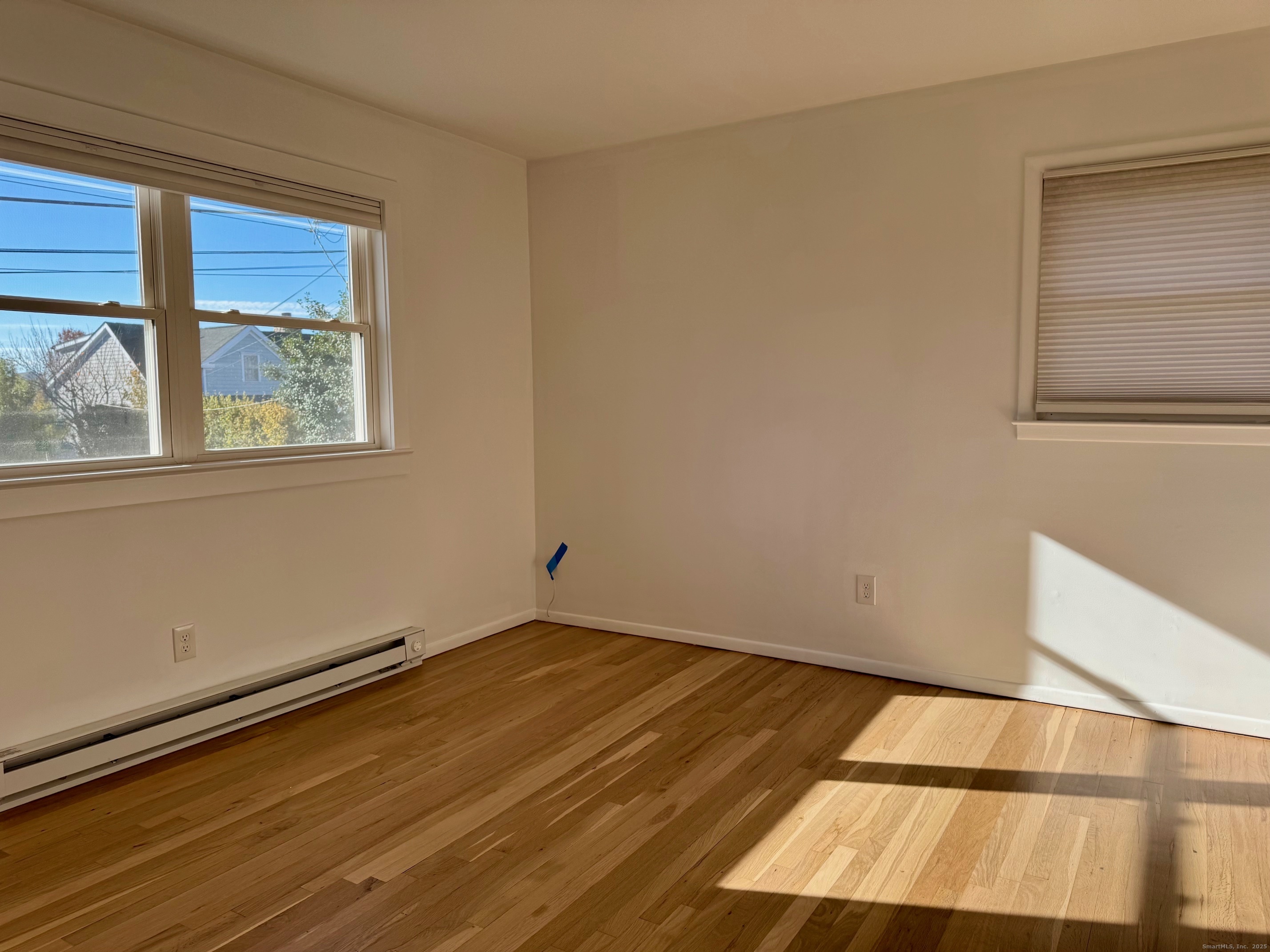 15 Sunwich Road Norwalk, CT 06853 - Photo 18 of 33 a view of an empty room with a window
