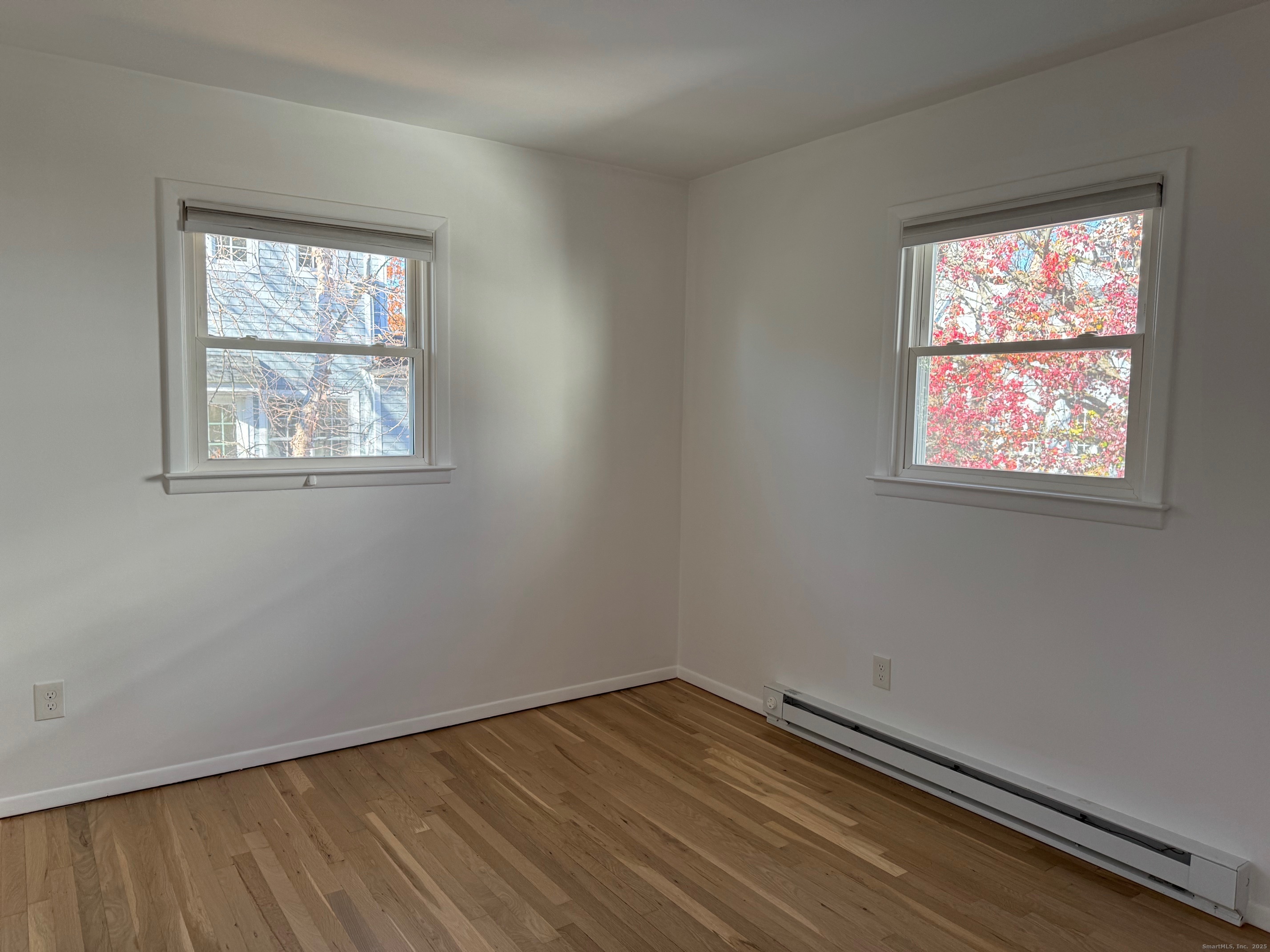 15 Sunwich Road Norwalk, CT 06853 - Photo 21 of 33 an empty room with a window