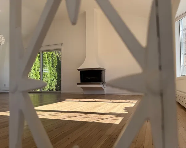 a view of kitchen with wooden floor and window