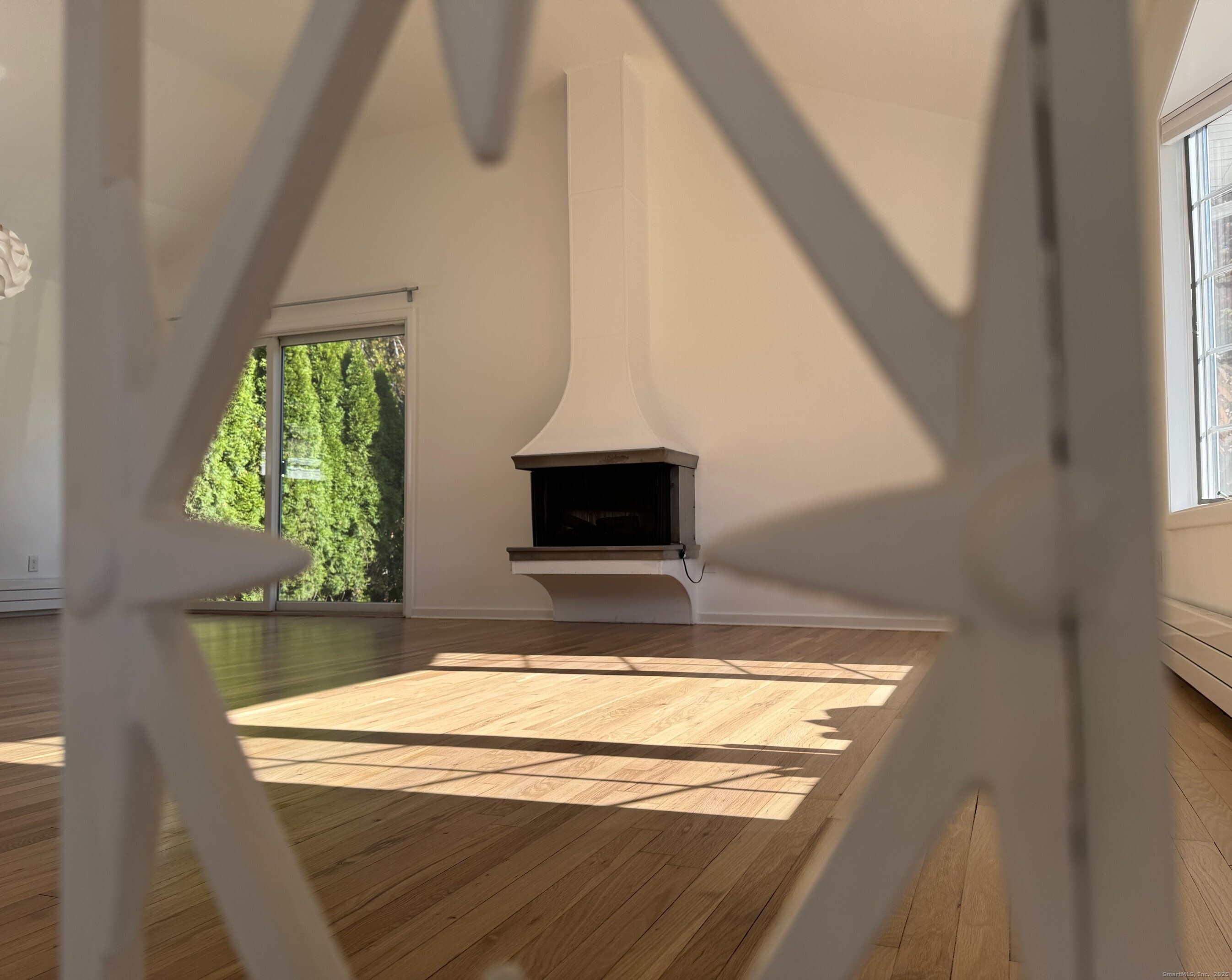 15 Sunwich Road Norwalk, CT 06853 - Photo 26 of 33 a view of kitchen with wooden floor and window