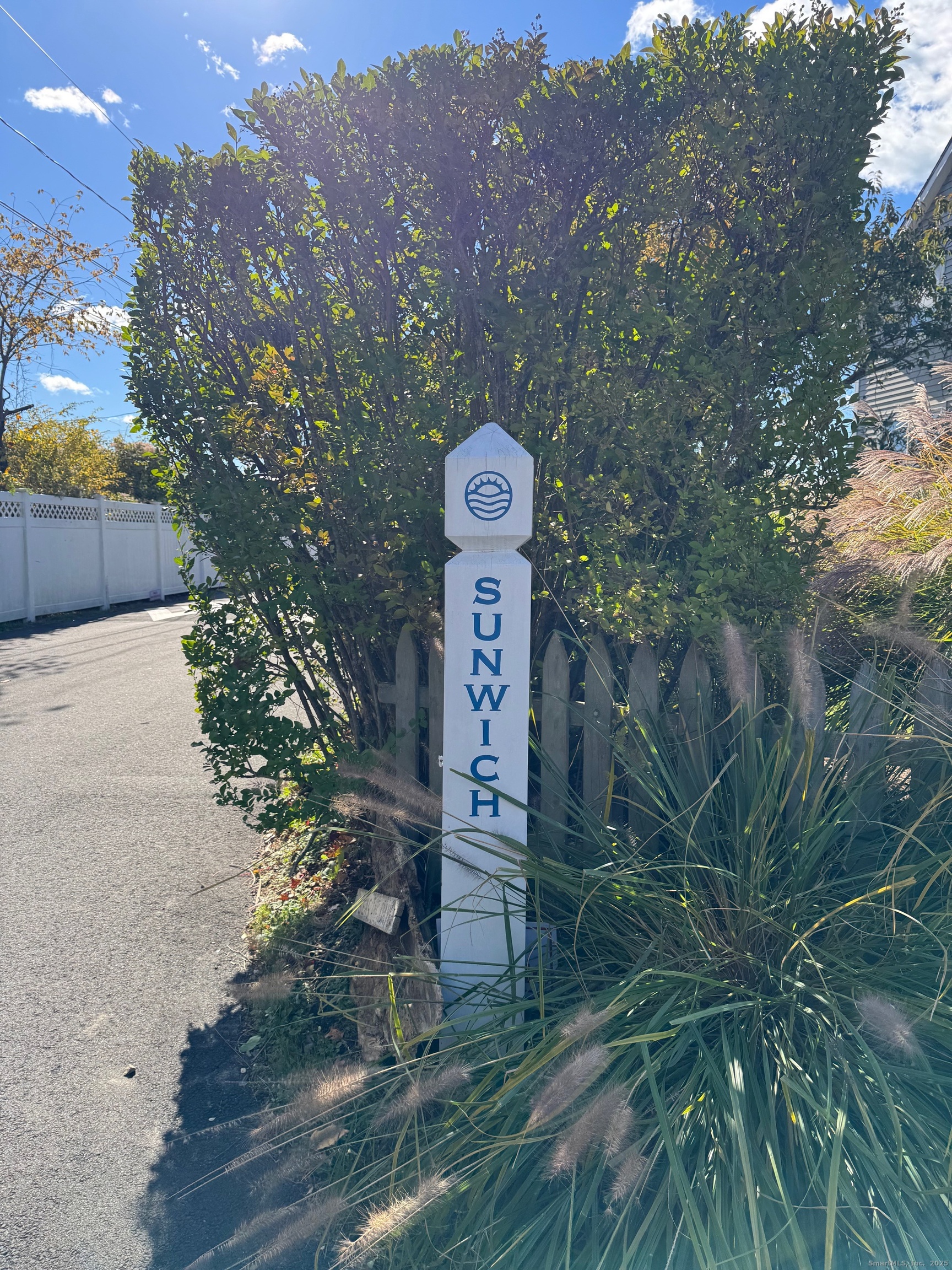 15 Sunwich Road Norwalk, CT 06853 - Photo 3 of 33 a picture of a tree in front of a house