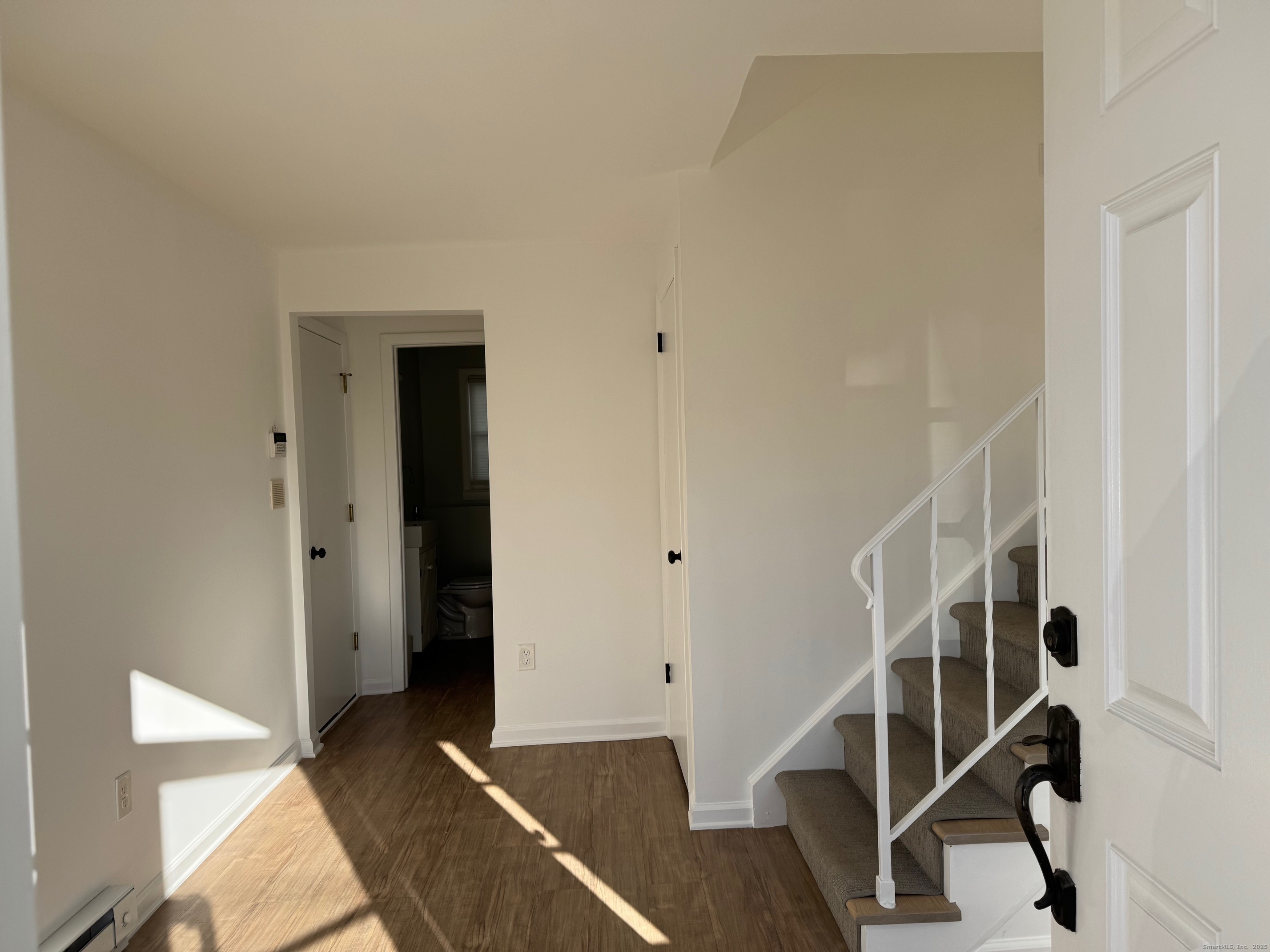 15 Sunwich Road Norwalk, CT 06853 - Photo 4 of 33 a view of entryway with wooden floor