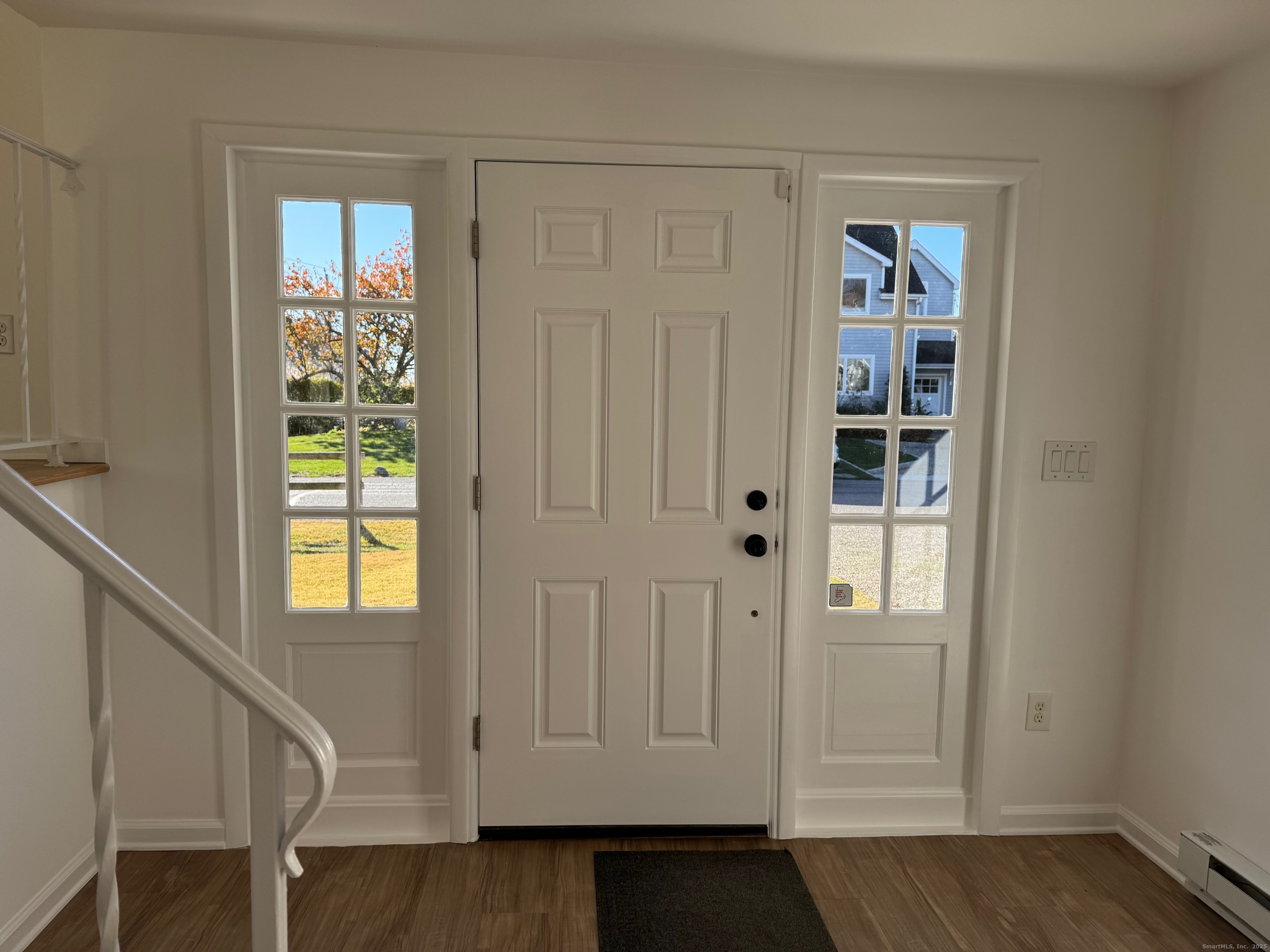 15 Sunwich Road Norwalk, CT 06853 - Photo 5 of 33 an entryway with wooden floor and windows