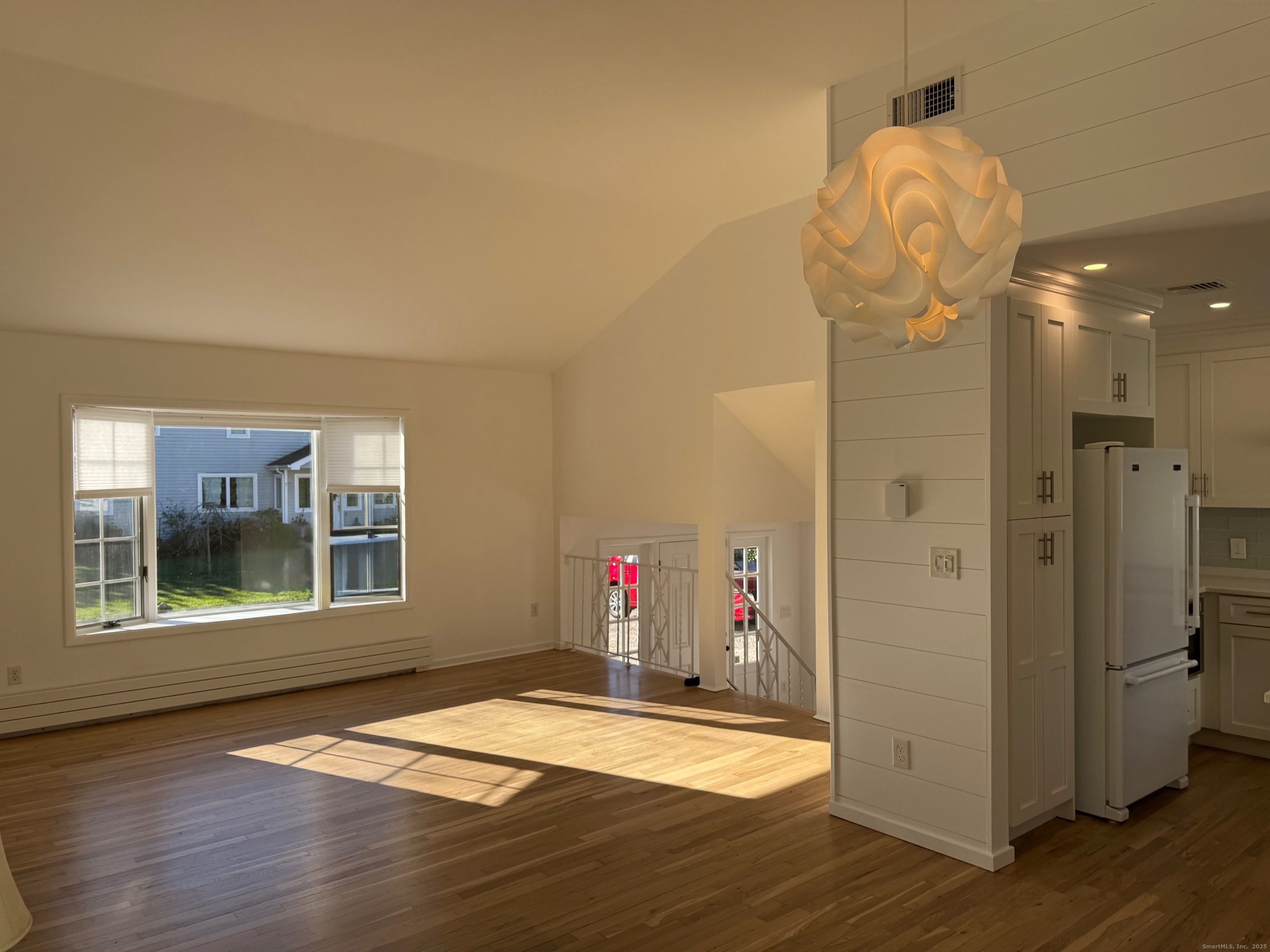 15 Sunwich Road Norwalk, CT 06853 - Photo 9 of 33 a view of empty room with wooden floor