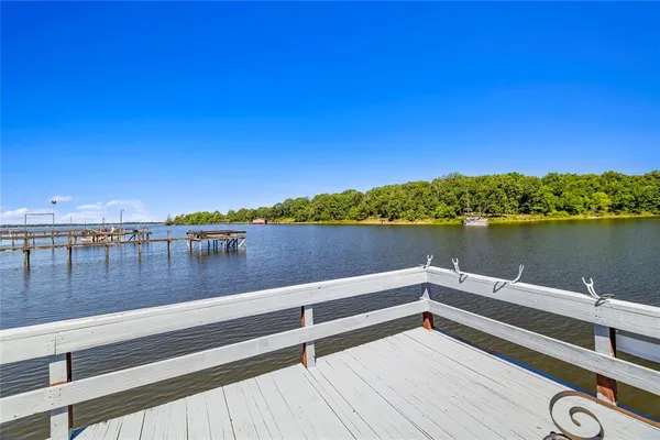 a view of wooden floor with a lake view