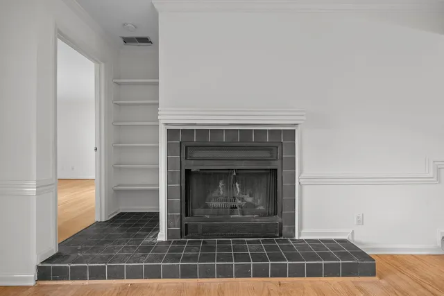 a living room with a fireplace
