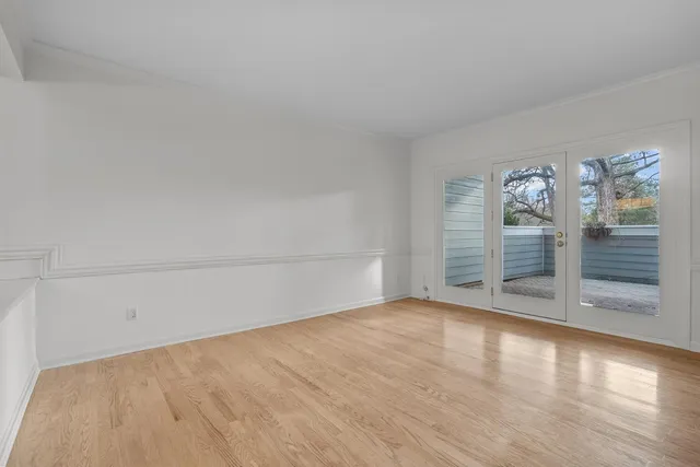 a view of a kitchen with a dishwasher and a refrigerator