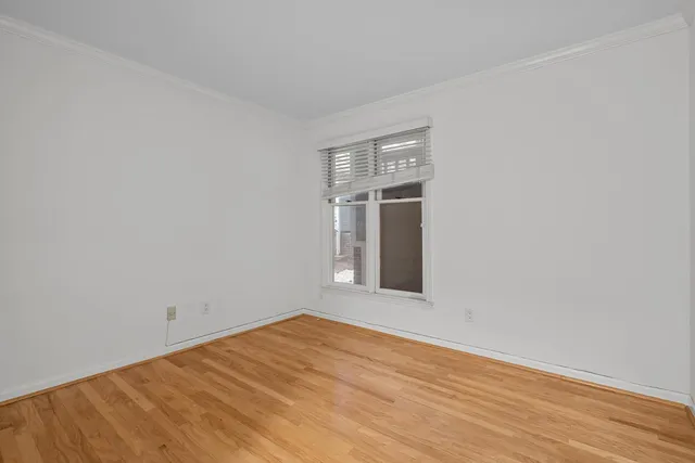 a view of house and chair in the balcony