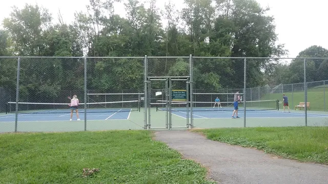 a view of a house with a backyard porch and sitting area