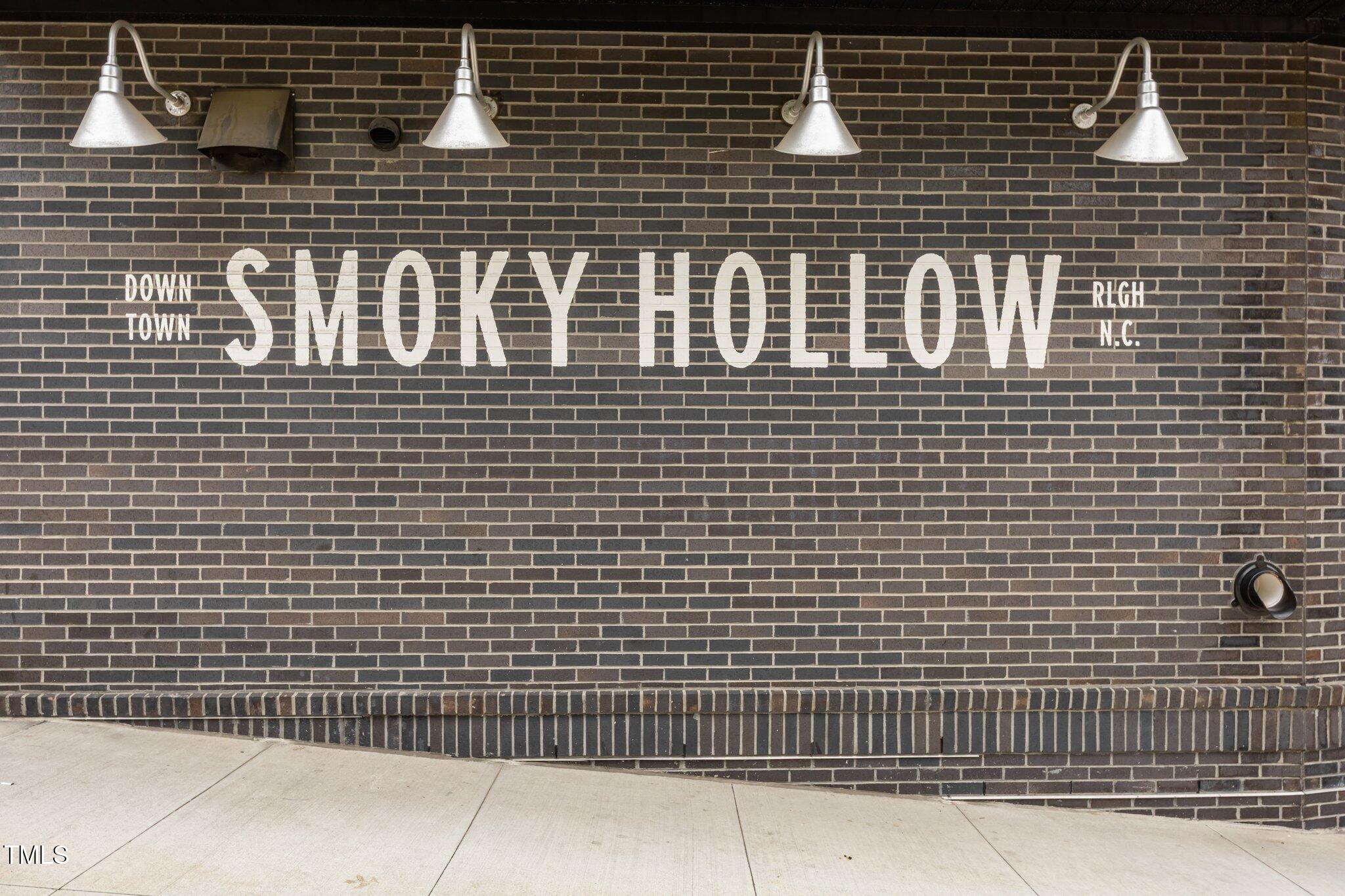 700 Bishops Park Drive, Unit 102 Raleigh, NC 27605 - Photo 47 of 56 a view of a brick wall