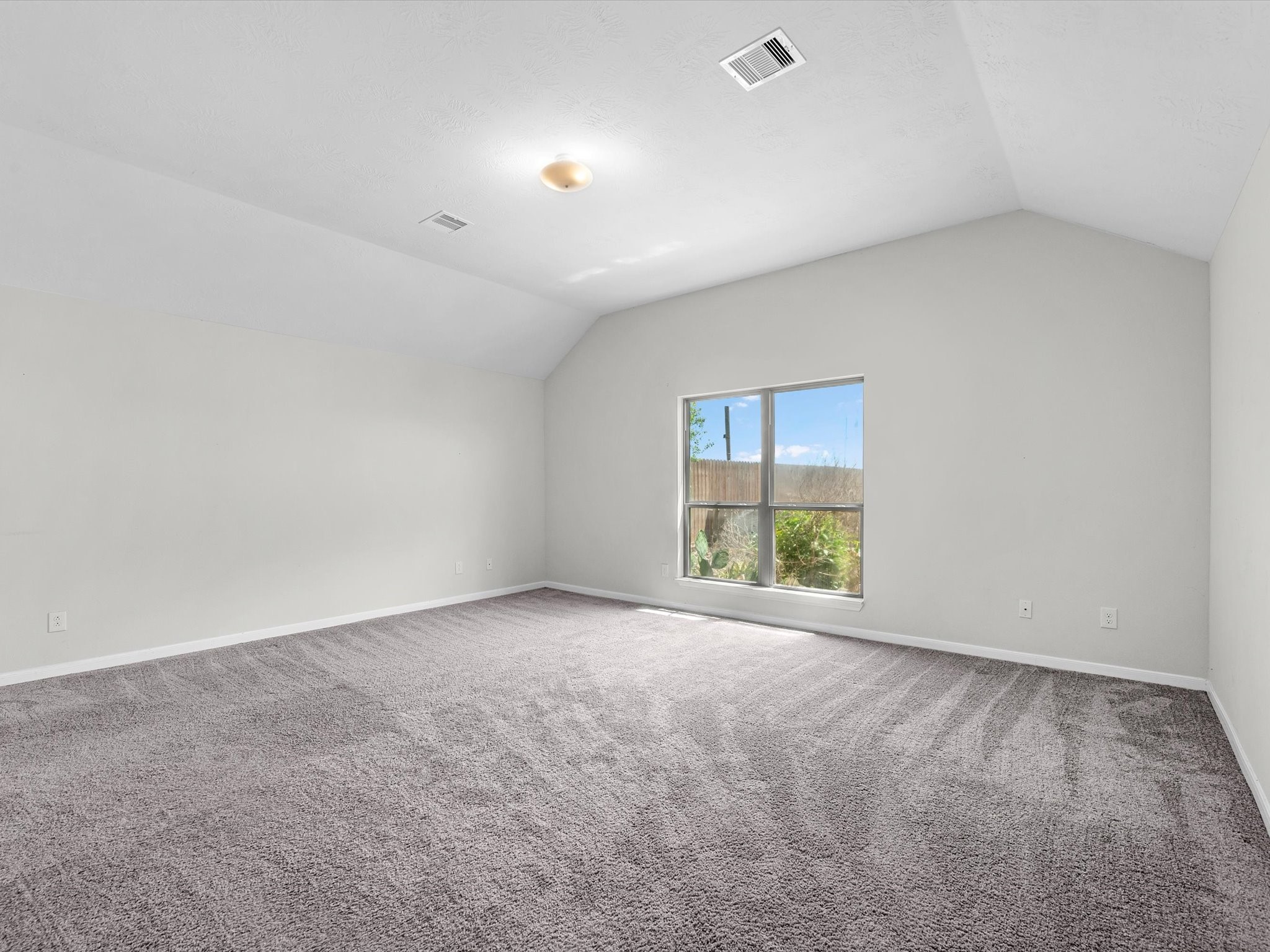 38 Palmero Way Manvel, TX 77578 - Photo 21 of 43 a view of an empty room with a window