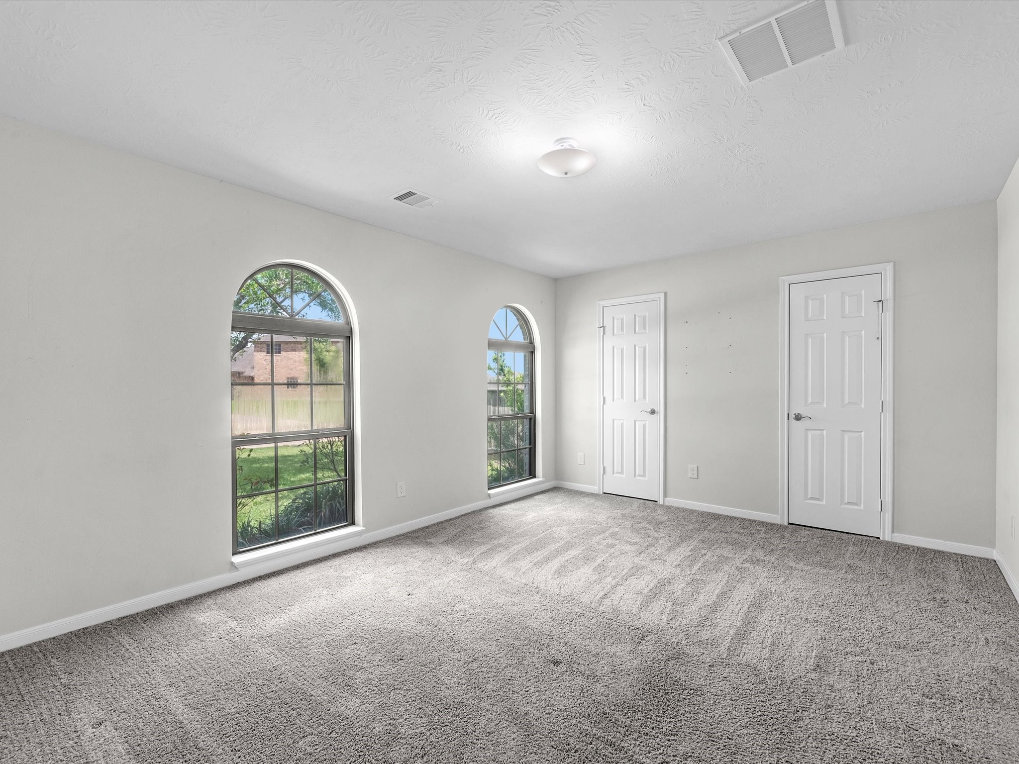 38 Palmero Way Manvel, TX 77578 - Photo 27 of 43 an empty room with windows