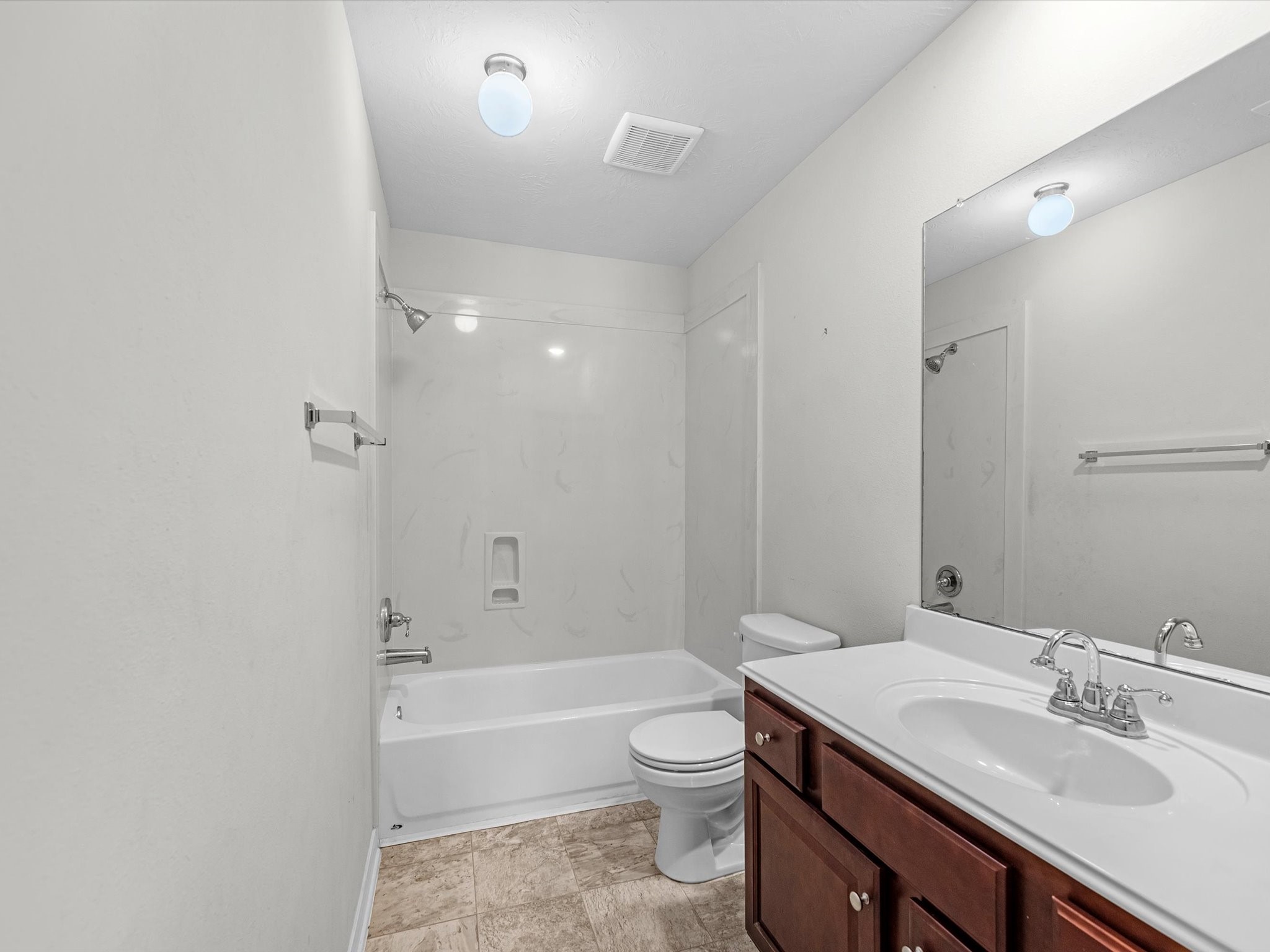 38 Palmero Way Manvel, TX 77578 - Photo 28 of 43 a bathroom with a sink a toilet and shower