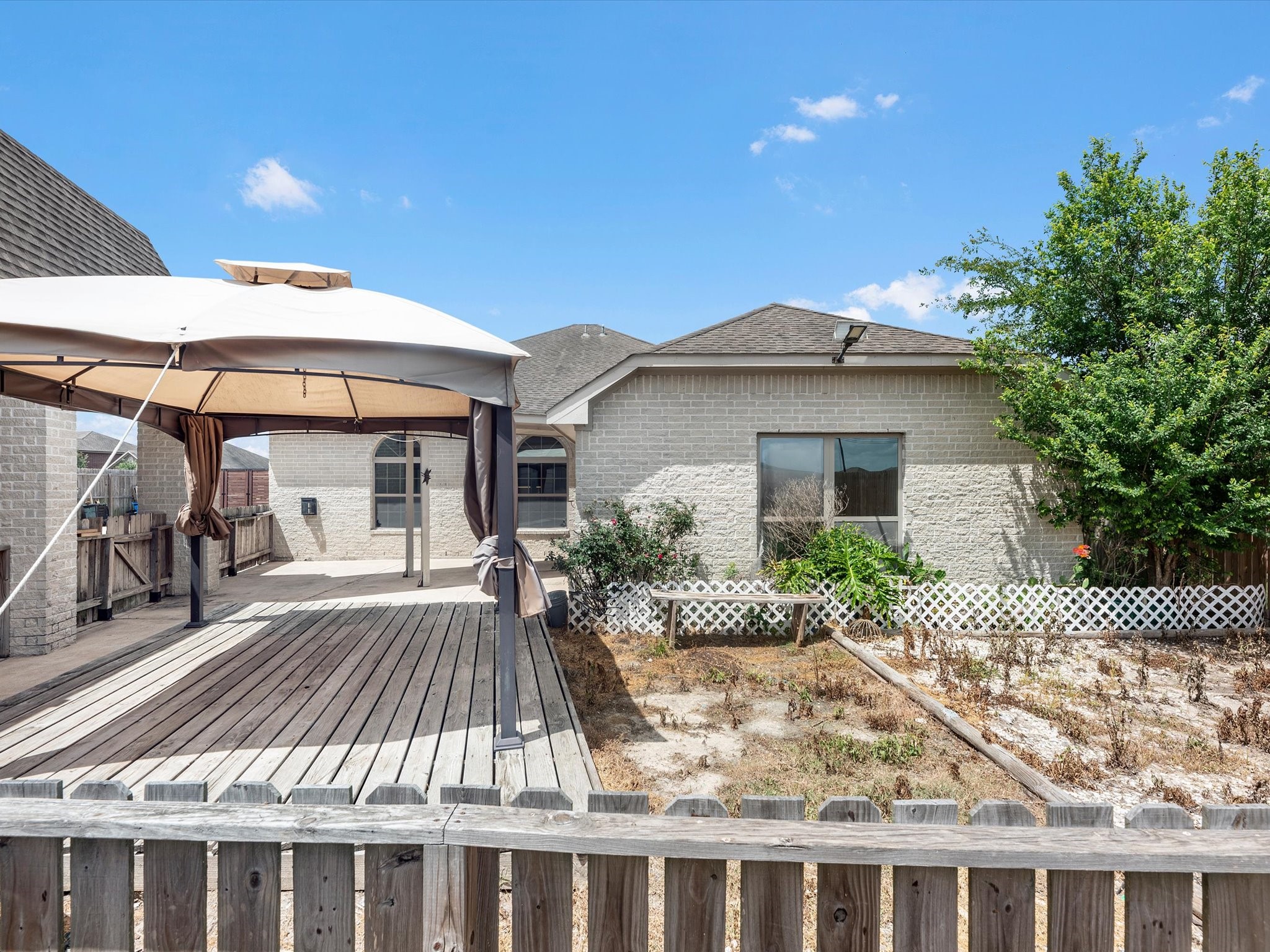 38 Palmero Way Manvel, TX 77578 - Photo 40 of 43 a view of a house with a patio