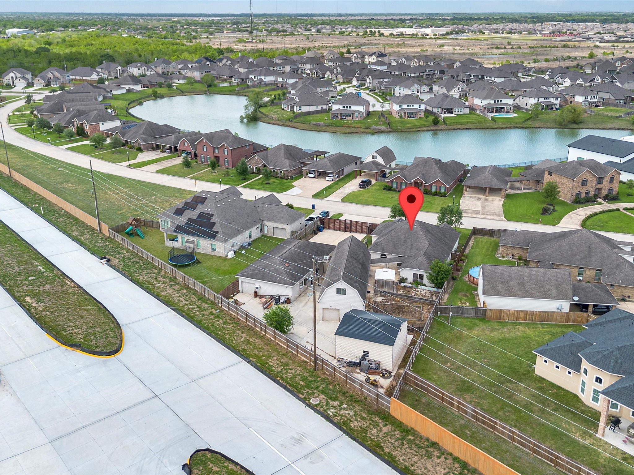 38 Palmero Way Manvel, TX 77578 - Photo 43 of 43 an aerial view of a house with a ocean view