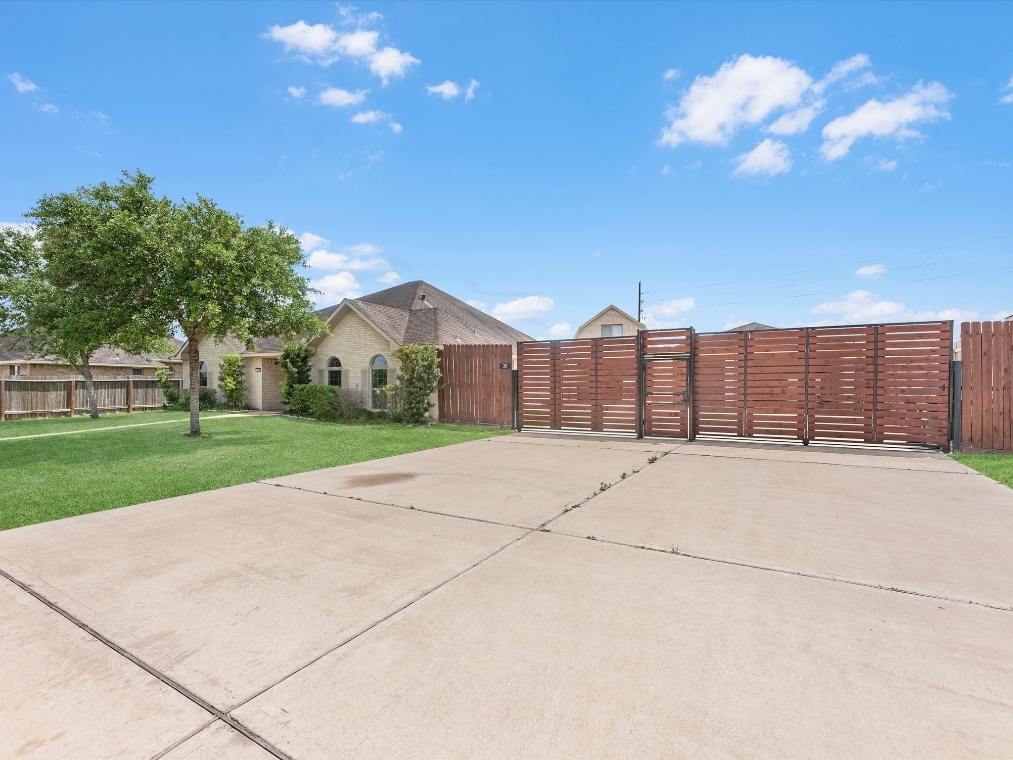 38 Palmero Way Manvel, TX 77578 - Photo 6 of 43 a view of a house with a yard and pathway