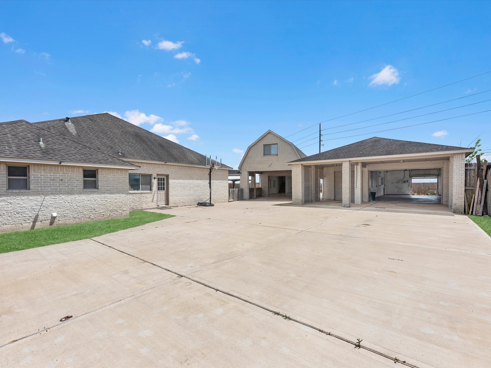 38 Palmero Way Manvel, TX 77578 - Photo 8 of 43 a front view of a house with a yard and garage