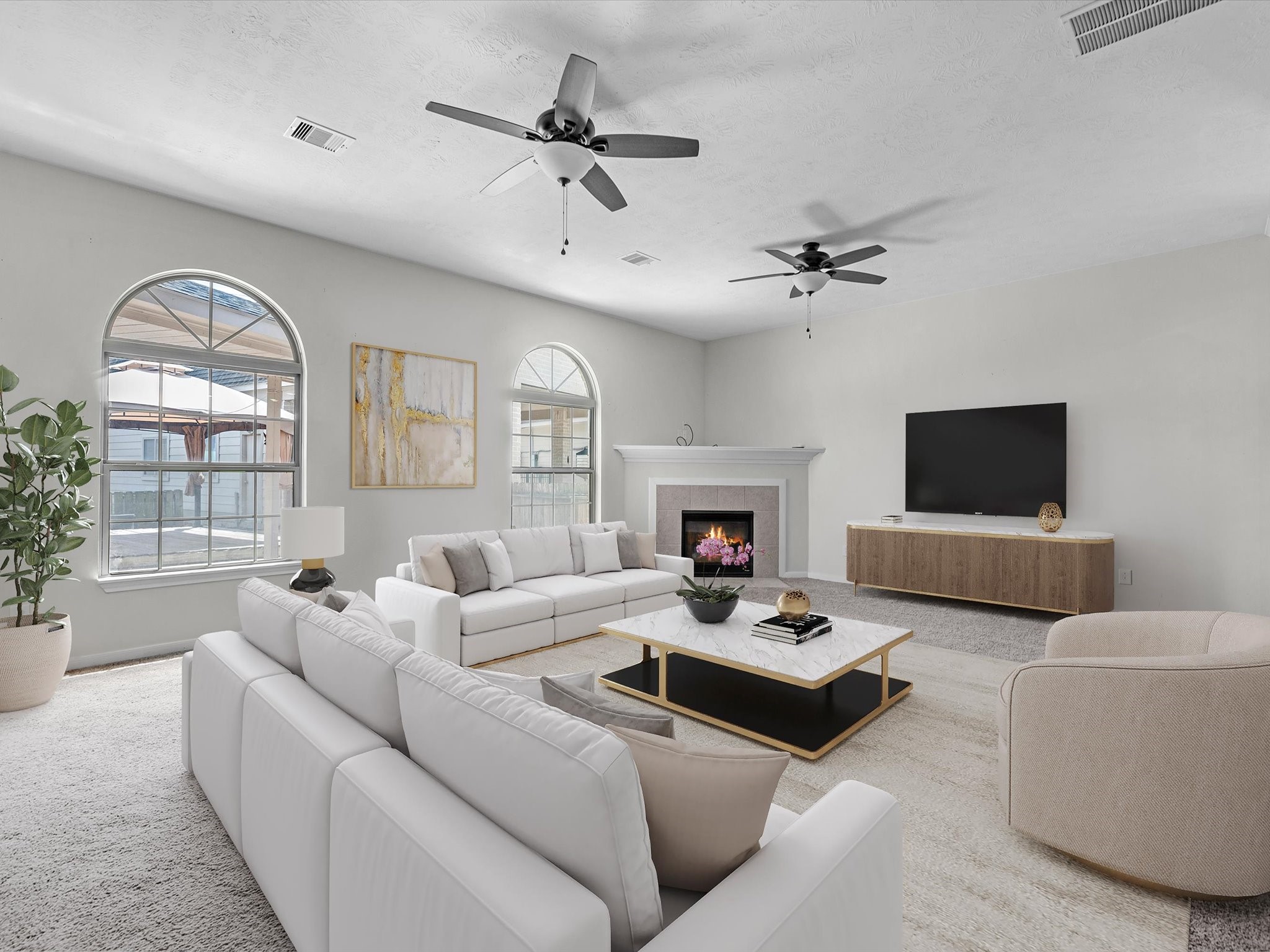 38 Palmero Way Manvel, TX 77578 - Photo 10 of 43 a living room with furniture and a fireplace