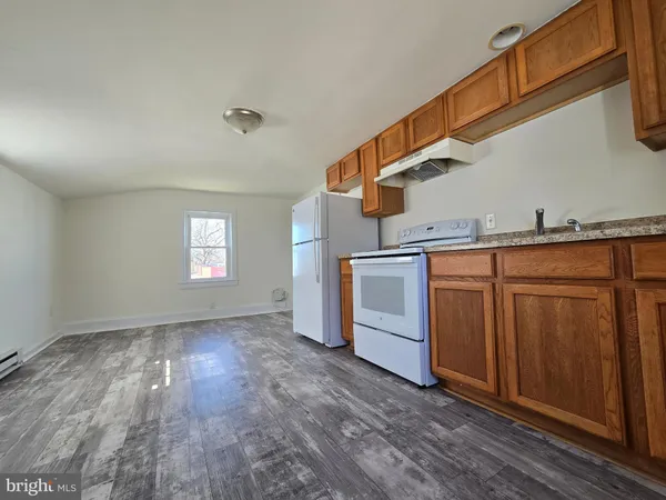 a view of a kitchen with a sink cabinets and window