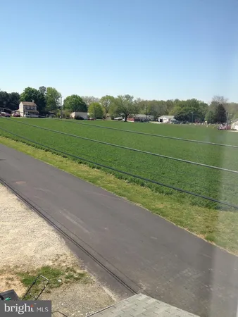 a house view with a backyard space