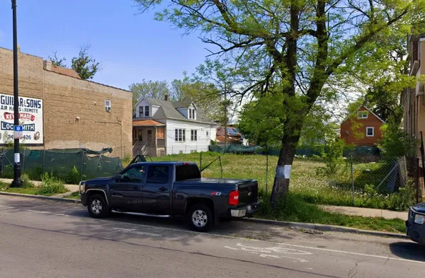 a car parked in front of a house