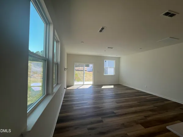 a view of an empty room and window
