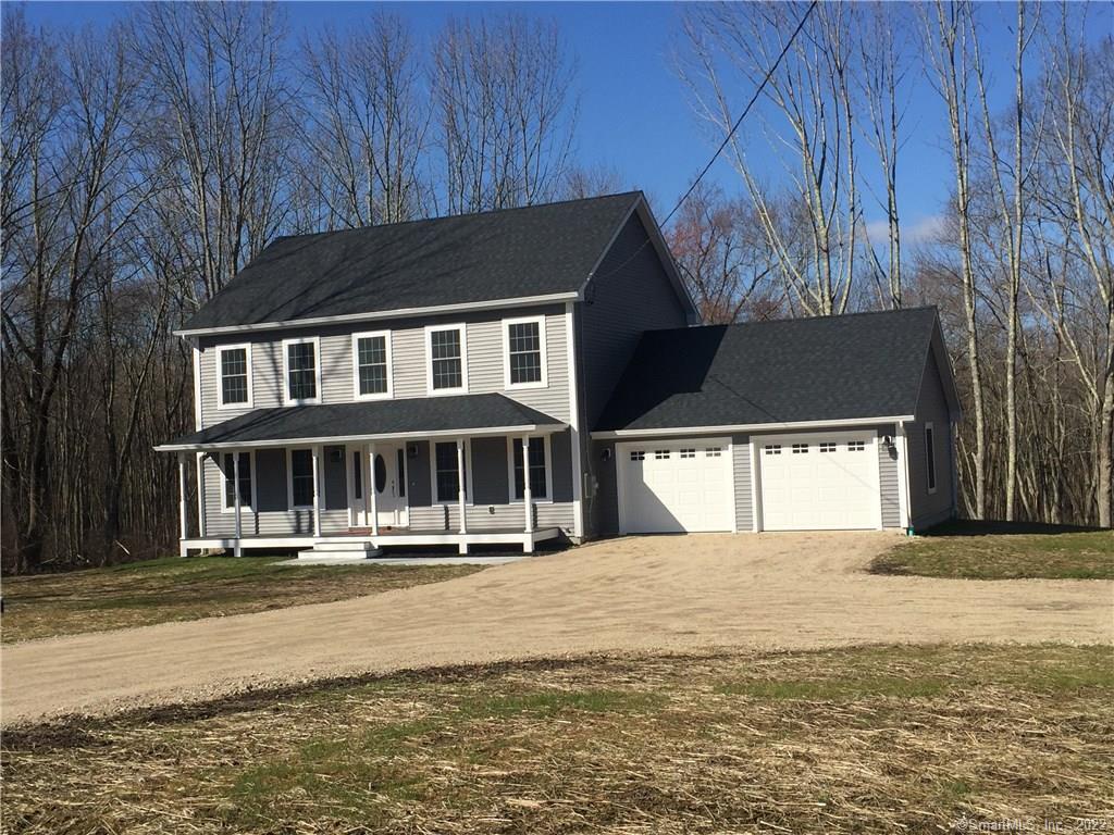 335 Spaulding Road Plainfield, CT 06374 - Photo 1 of 1 a front view of a house with a yard