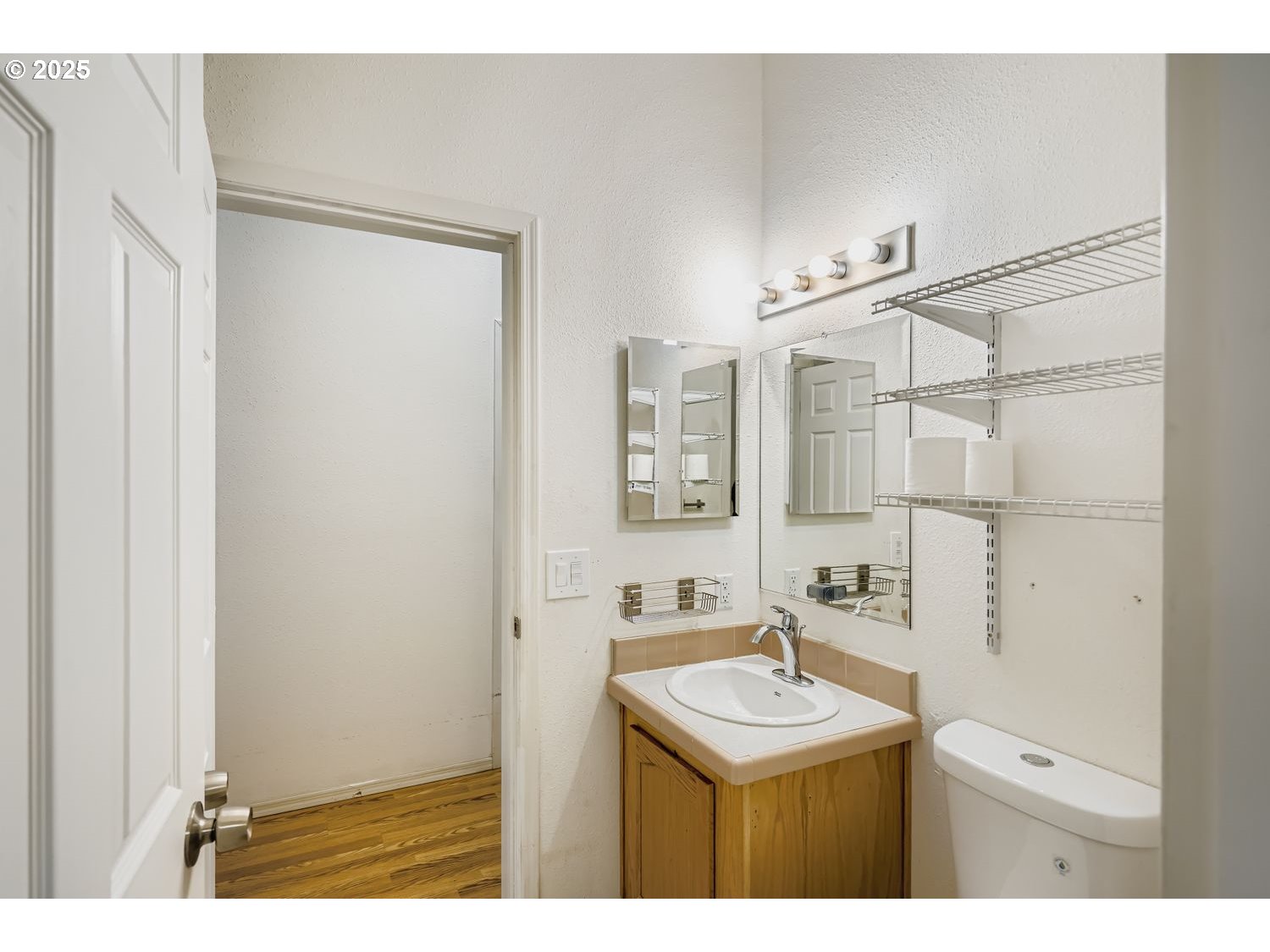 2111 Pippin Street Northeast Salem, OR 97305 - Photo 17 of 26 a bathroom with a sink and a mirror