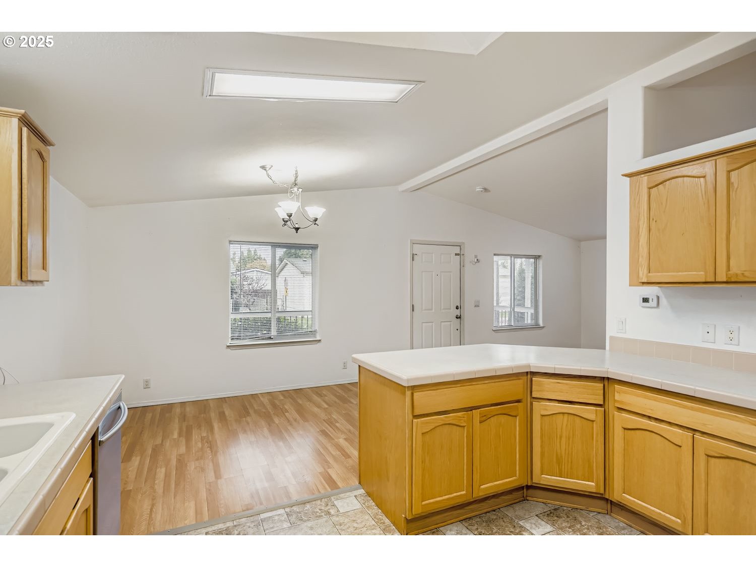 2111 Pippin Street Northeast Salem, OR 97305 - Photo 9 of 26 a view of a kitchen with wooden cabinet