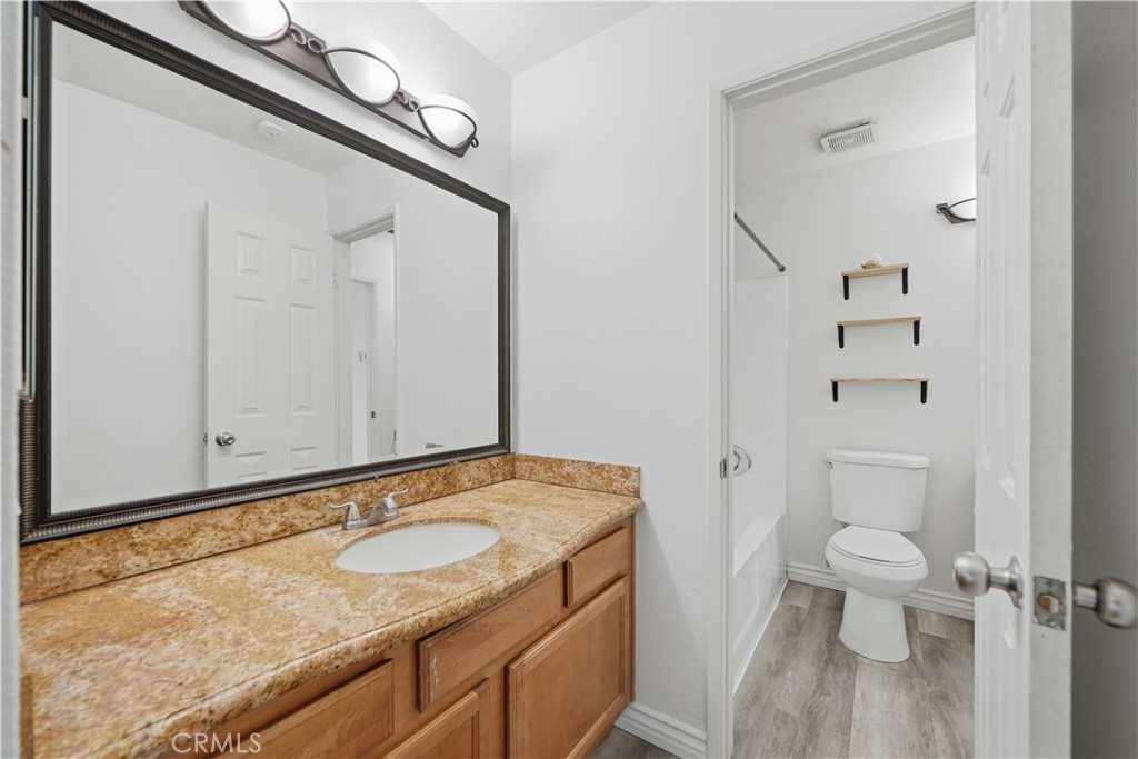 1142 West Blaine Street Riverside, CA 92507 - Photo 15 of 33 Separate sink from shared bathroom.