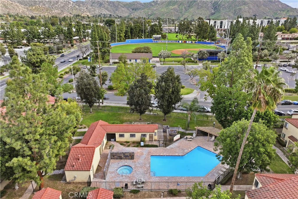 1142 West Blaine Street Riverside, CA 92507 - Photo 18 of 33 Community pool and spa. UCR Baseball field adjacent