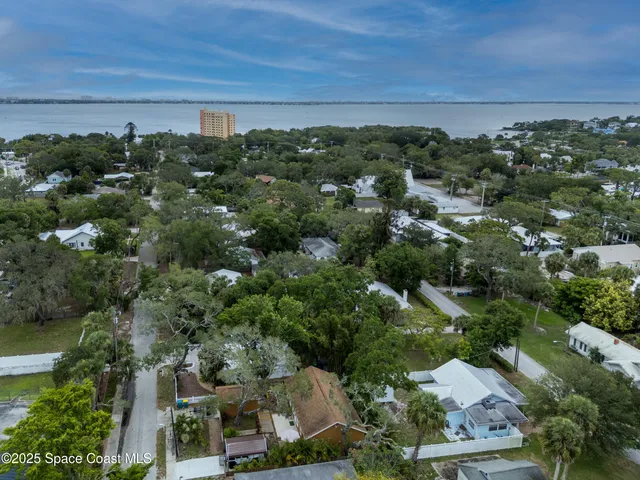 an aerial view of a city with lots of residential buildings