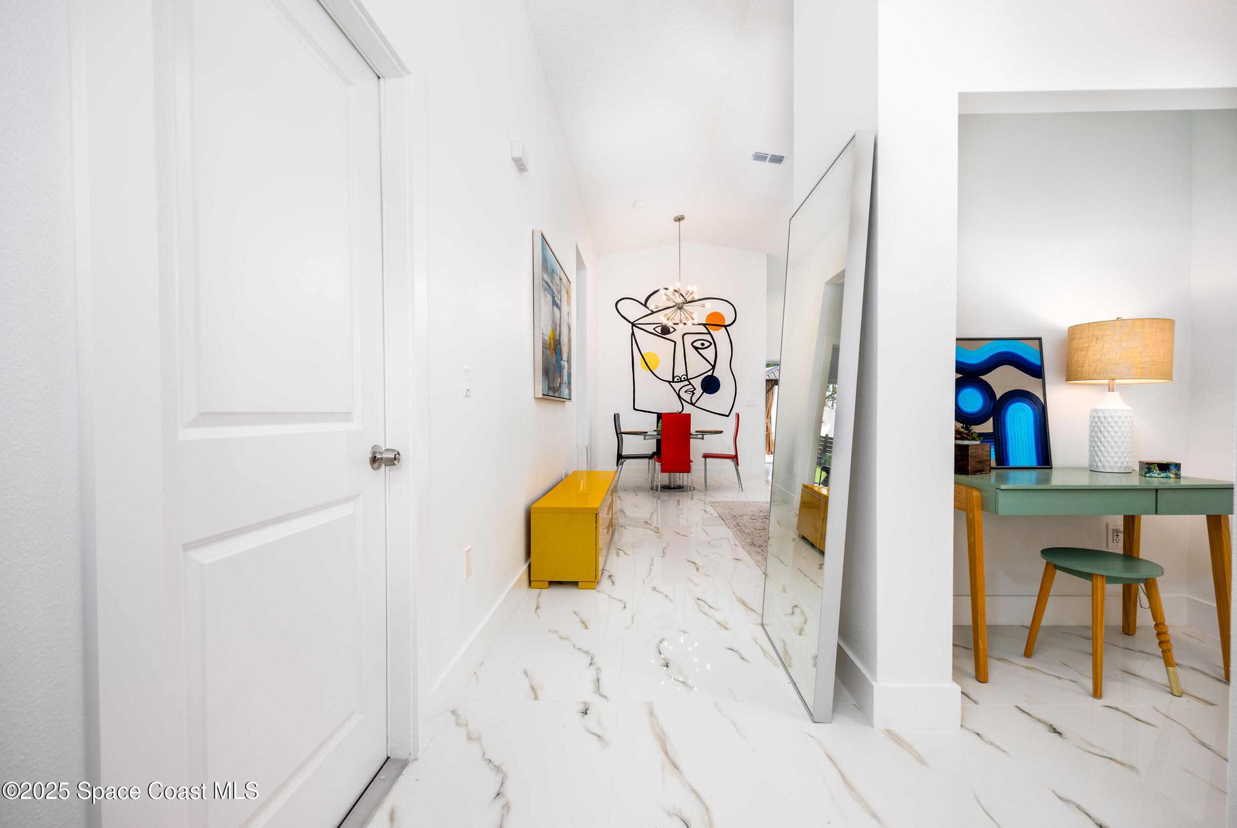 702 Shady Lane Melbourne, FL 32935 - Photo 3 of 14 a view of a room with gym equipment