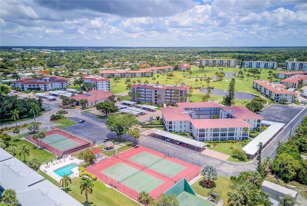 29 High Point Circle East, Unit 106 Naples, FL 34103 - Photo 28 of 42 a view of a city